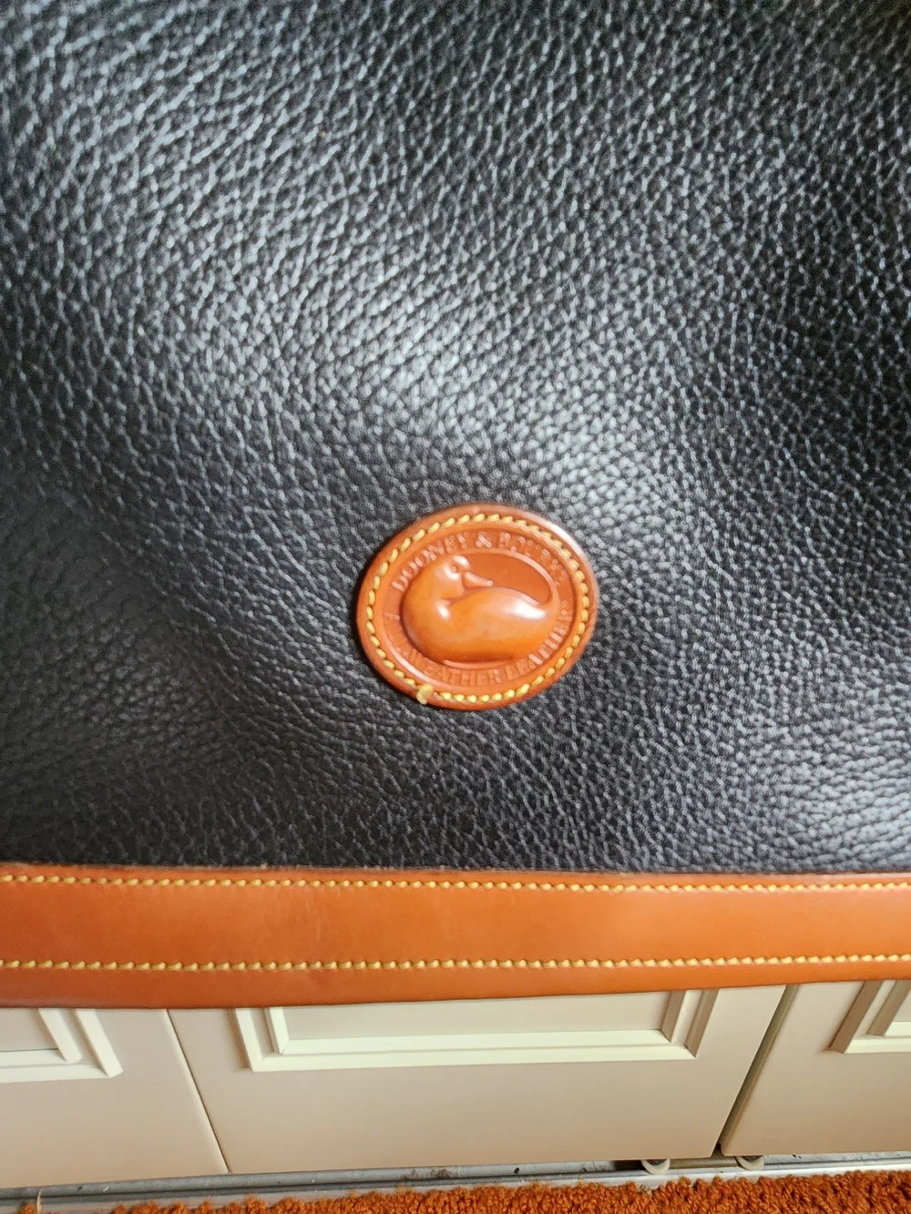 DOONEY & BOURKE Classic Black and Brown Leather Shoulder Bag
